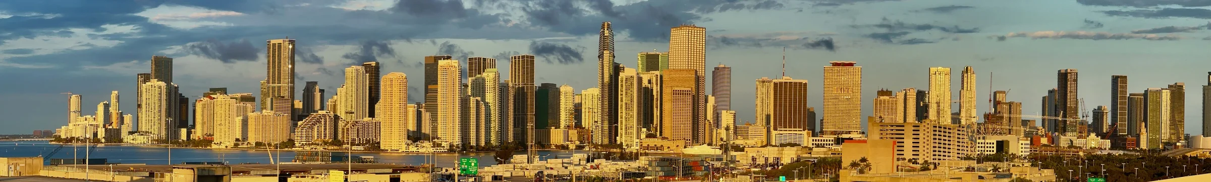 Miami skyline across the water at first light