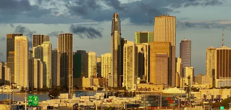Miami skyline across the water at first light